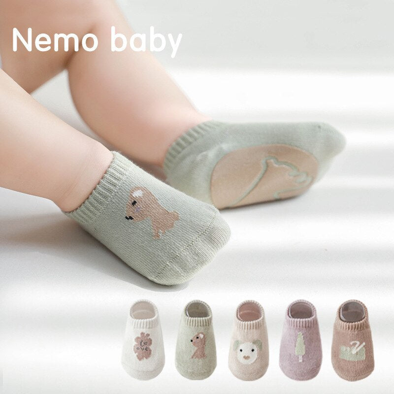 Cotton blend non-skid ankle socks for children, durable and perfect for everyday wear.
