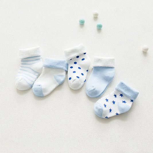 Five pairs of unisex baby cotton cartoon thick socks in assorted colors for newborns.