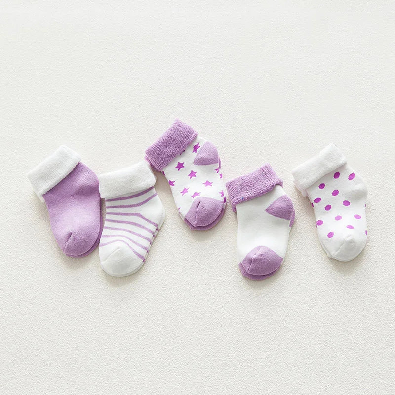 Infant apparel: Five pairs of durable, thick cotton socks featuring charming cartoon prints.