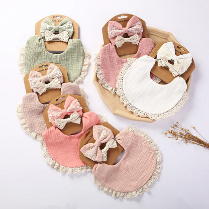 Five soft cotton bamboo baby drool bibs in various colors, perfect for nursing & feeding.