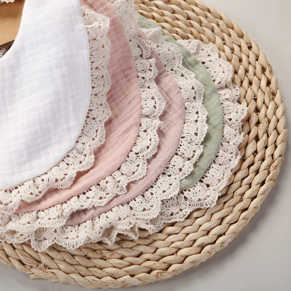 A set of five unisex baby bibs, made from eco-friendly cotton bamboo for sensitive skin.