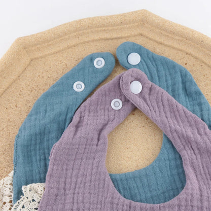 Practical 5-pack of cotton bamboo baby bibs, offering protection during feeding and teething.