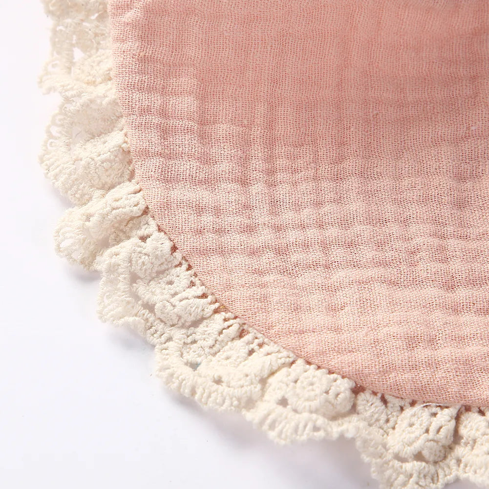 Assortment of muted color cotton bamboo baby bibs, ideal for a newborn gift set.