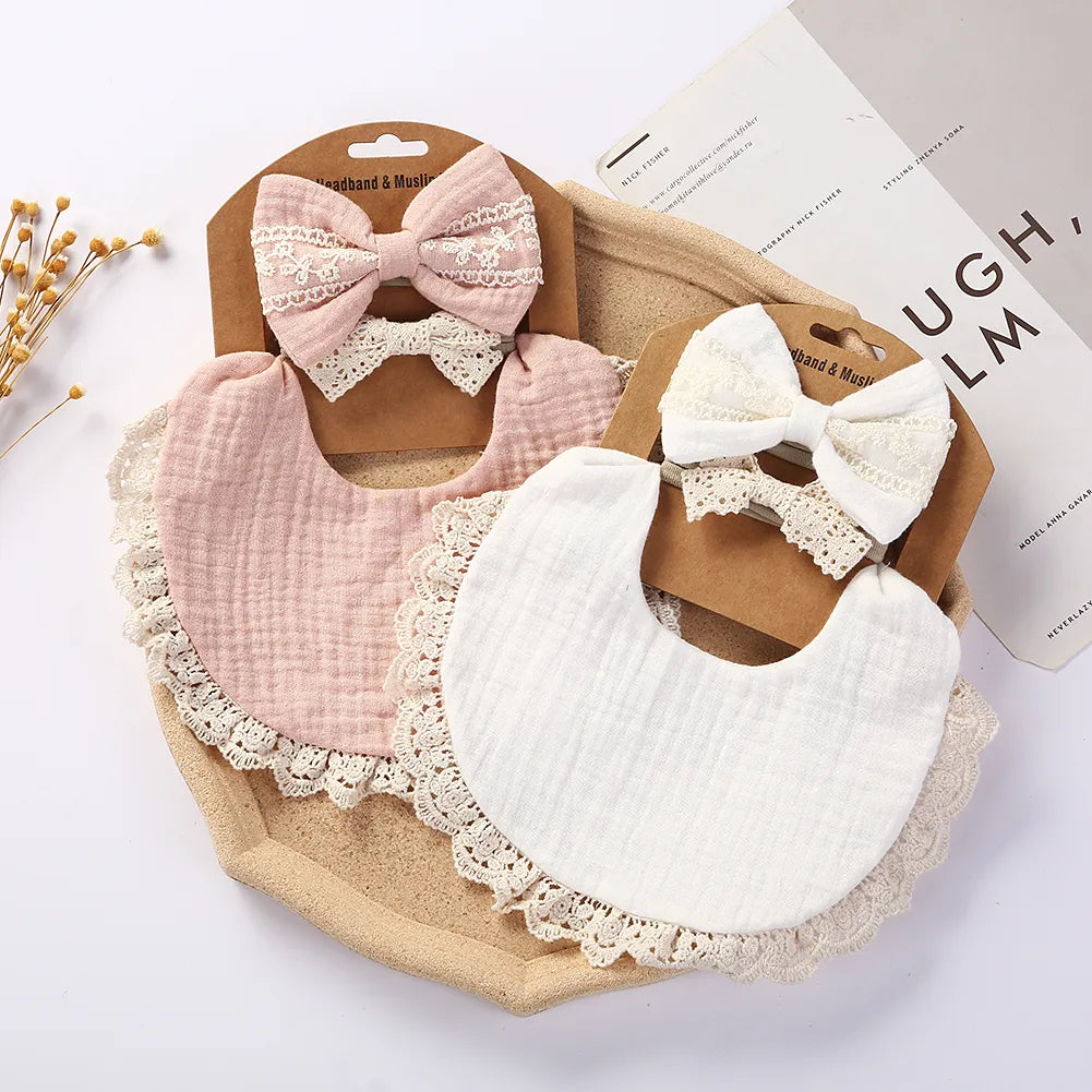 Close-up of a blue cotton bamboo baby bib, highlighting the soft texture and absorbent design.