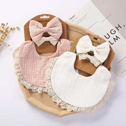 Close-up of a blue cotton bamboo baby bib, highlighting the soft texture and absorbent design.