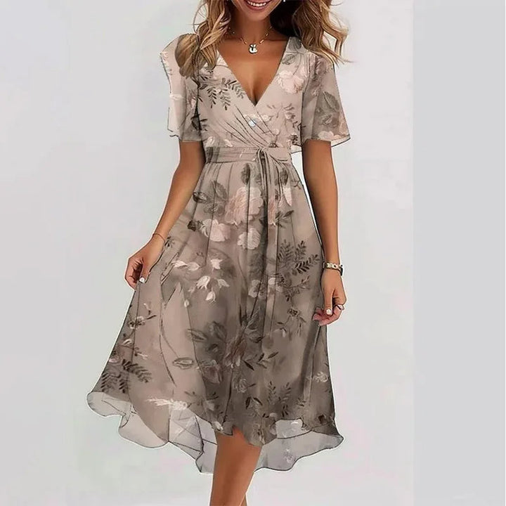 Versatile short sleeve A-line midi dress for women with a flattering V-neck. Perfect casual or elegant summer fashion.