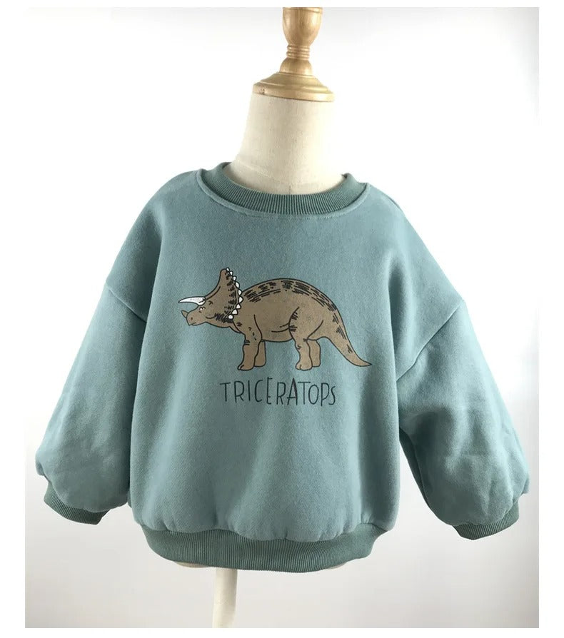Front view of a warm fleece-lined dinosaur sweater, fun and practical children's winter wear