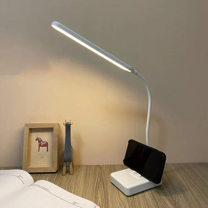 Sleek LED desk lamp for home office or bedroom, offering adjustable, dimmable light for reading.