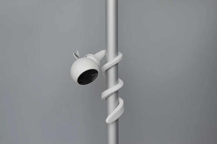 Adjustable flexible baby monitor holder, compatible with most camera brands, nursery essential.