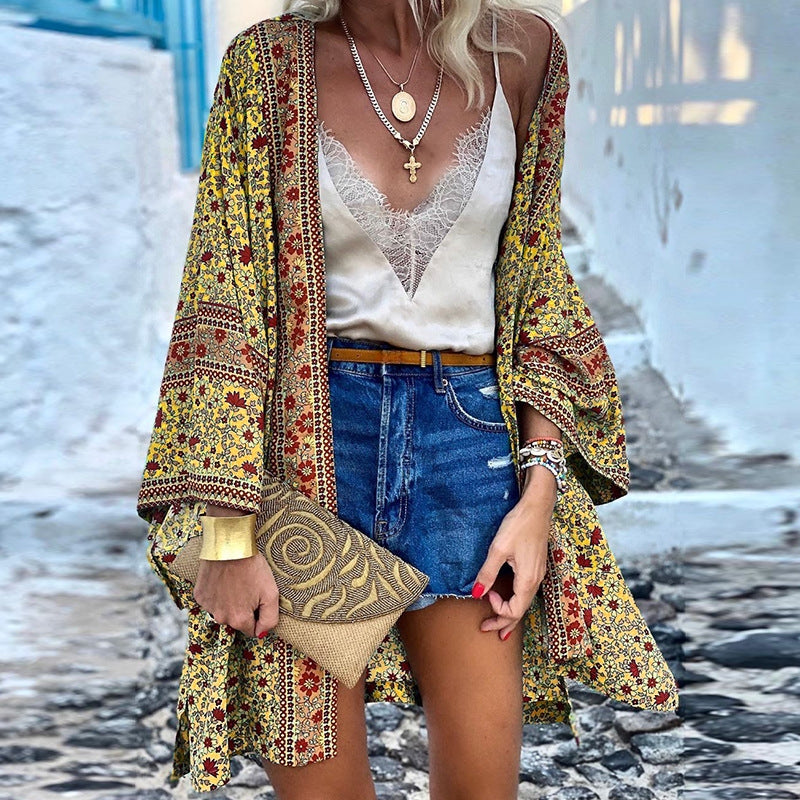 Flowy women's boho pattern cardigan. Stylish loose fit long sleeve for a fashionable layered look. Casual wear.