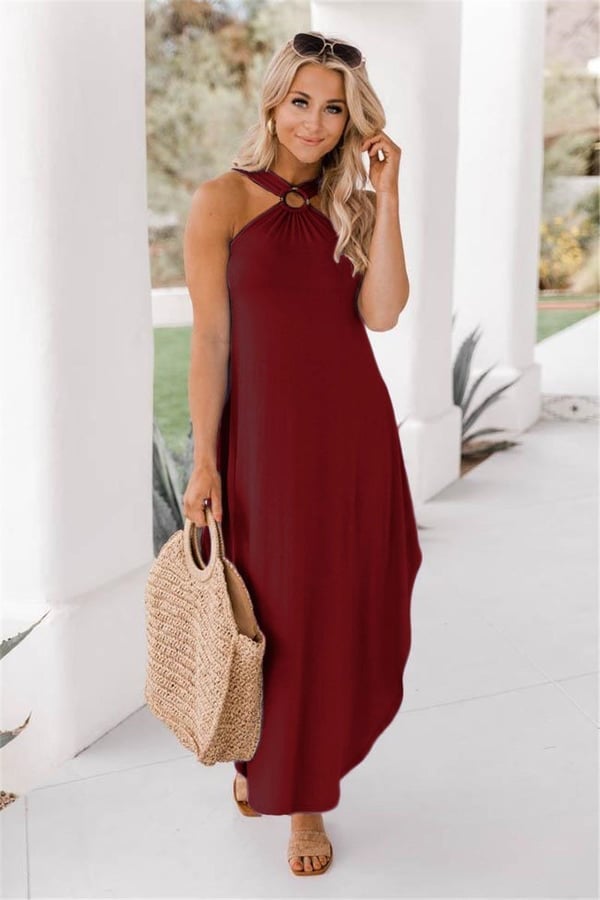 Breezy women's halter neck maxi dress, elegant and comfortable, featuring a prominent ring detail.