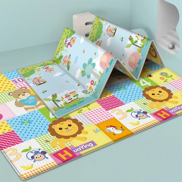 Foldable baby play mat, reversible alphabet & city design, providing a safe, educational kids' rug