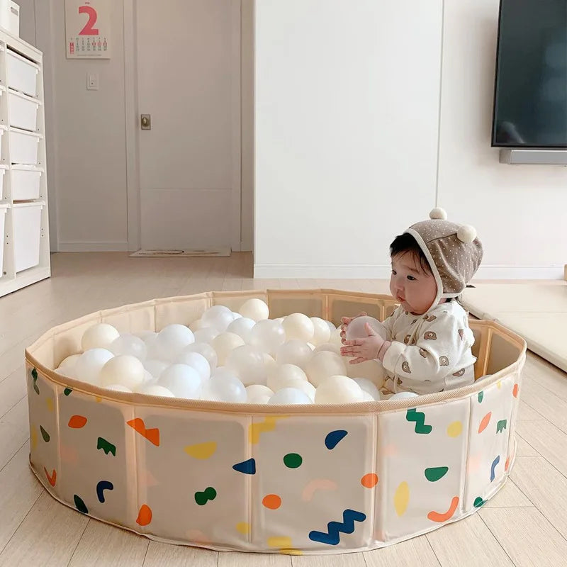 Foldable PVC child's playpen with colorful balls, perfect for safe indoor baby play area