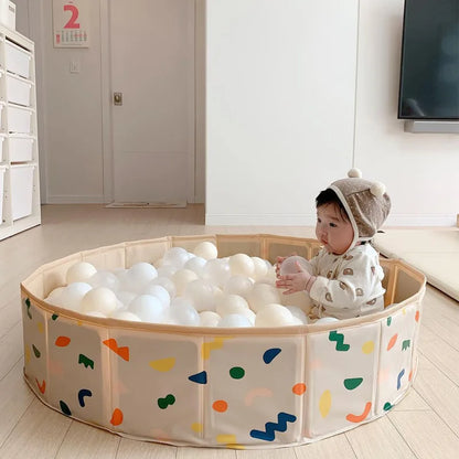 Foldable PVC child's playpen with colorful balls, perfect for safe indoor baby play area