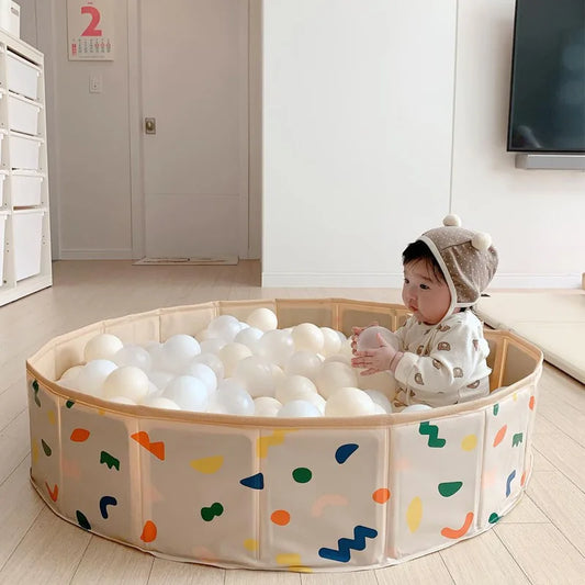 Foldable PVC child's playpen with colorful balls, perfect for safe indoor baby play area