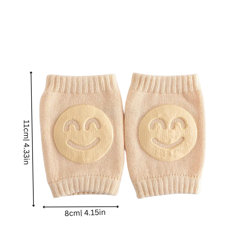 Close-up of a baby crawling with patterned anti-slip knee pads protecting knees