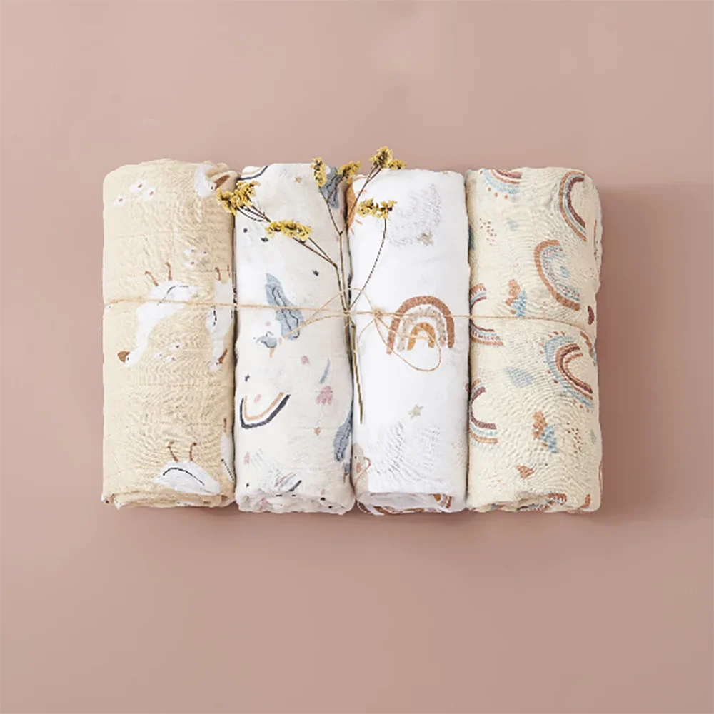 Open bamboo cotton muslin swaddle blanket draped, showcasing its large size for baby wrap