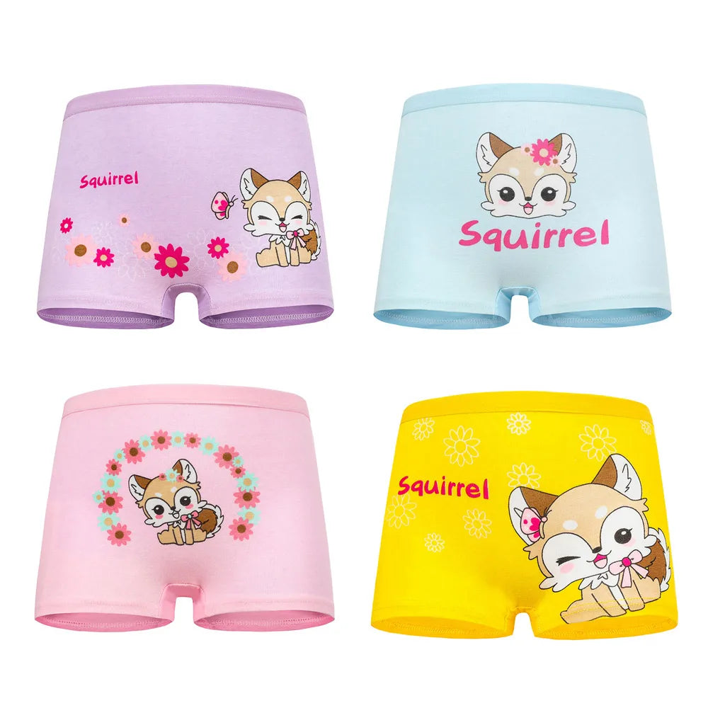 Close-up of pink girls' cotton panties with a cute unicorn print, comfortable children's briefs.