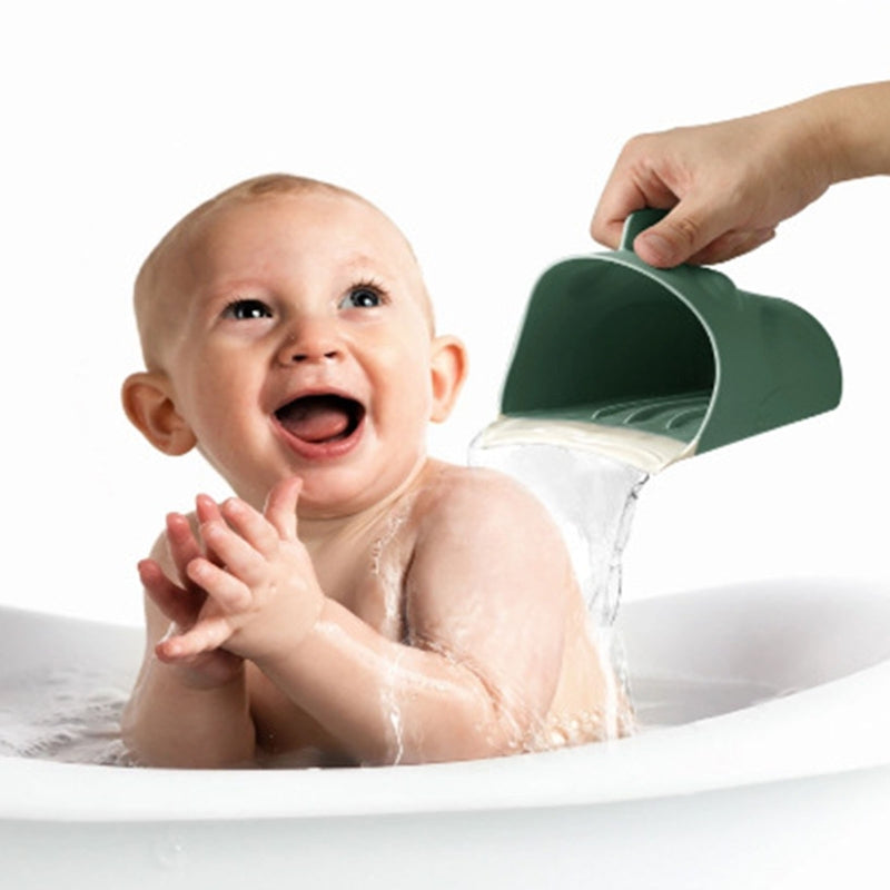 Soft green frog baby rinse cup, a safe and fun shampoo rinser for infants.