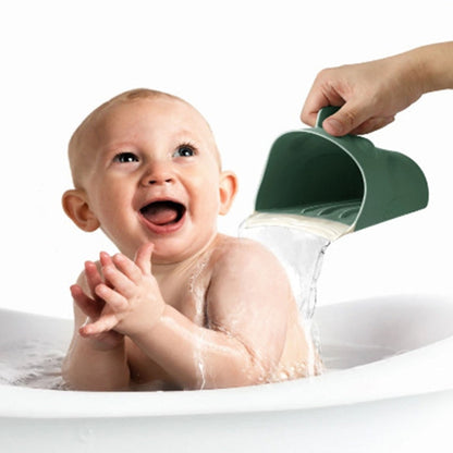 Soft green frog baby rinse cup, a safe and fun shampoo rinser for infants.