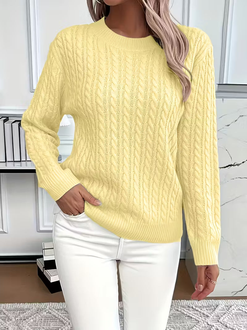 Women's autumn fashion essential: a comfortable cable knit crew neck pullover for stylish layering.