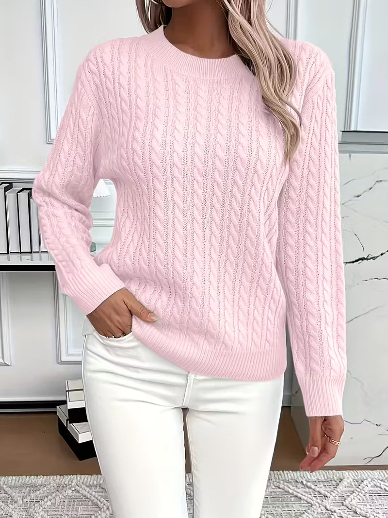 Premium quality women's cable knit crew neck jumper, providing warmth and style for autumn layering.