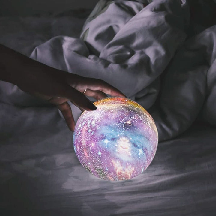 Gift-ready 3D moon lamp. 16 color-changing LED galaxy light with a sturdy wooden stand, for any room.