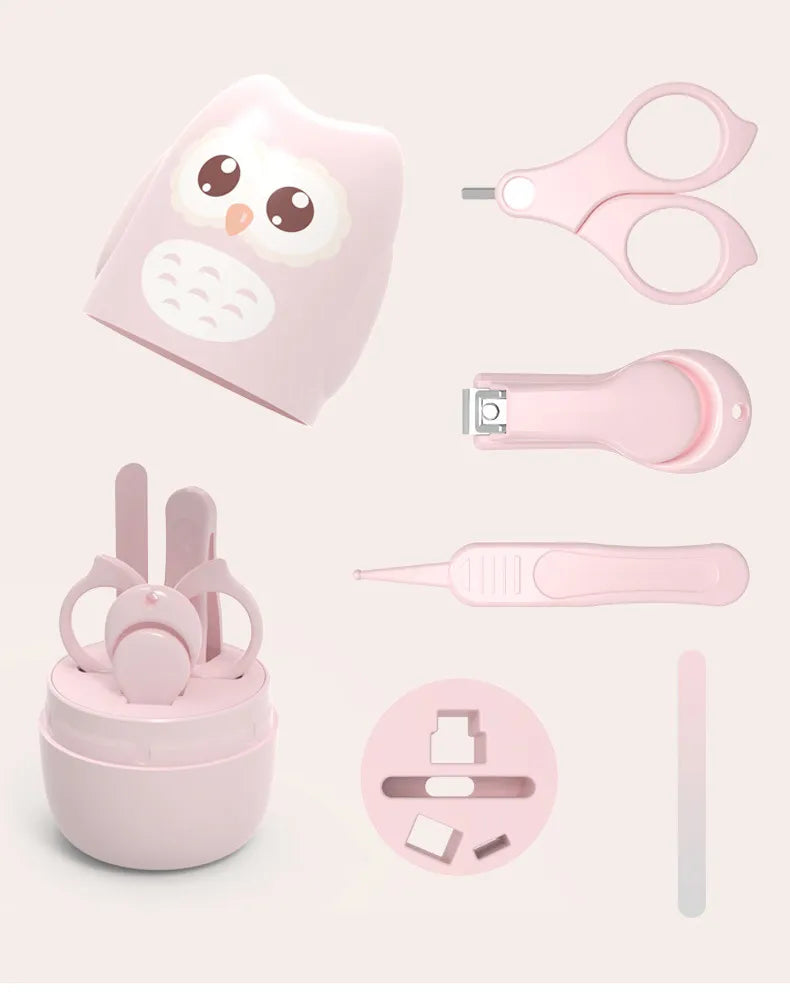 Open baby nail care set showing clippers, scissors, file & tweezers in a soft green portable kit. Infant grooming.