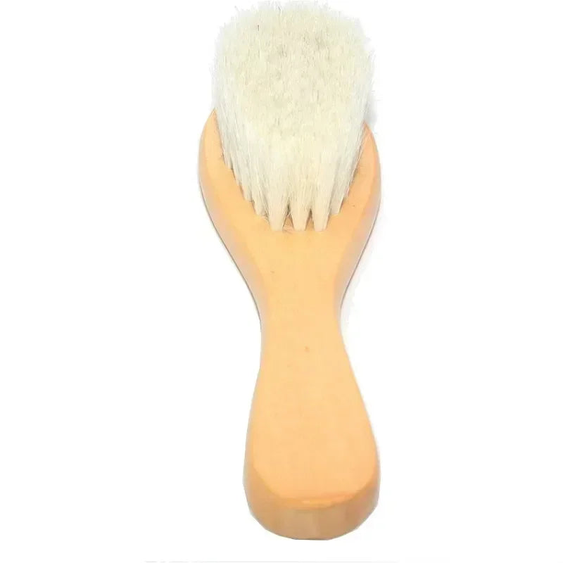 Detailed view of wool bristles on a wooden baby hair comb, designed for comfort and safety