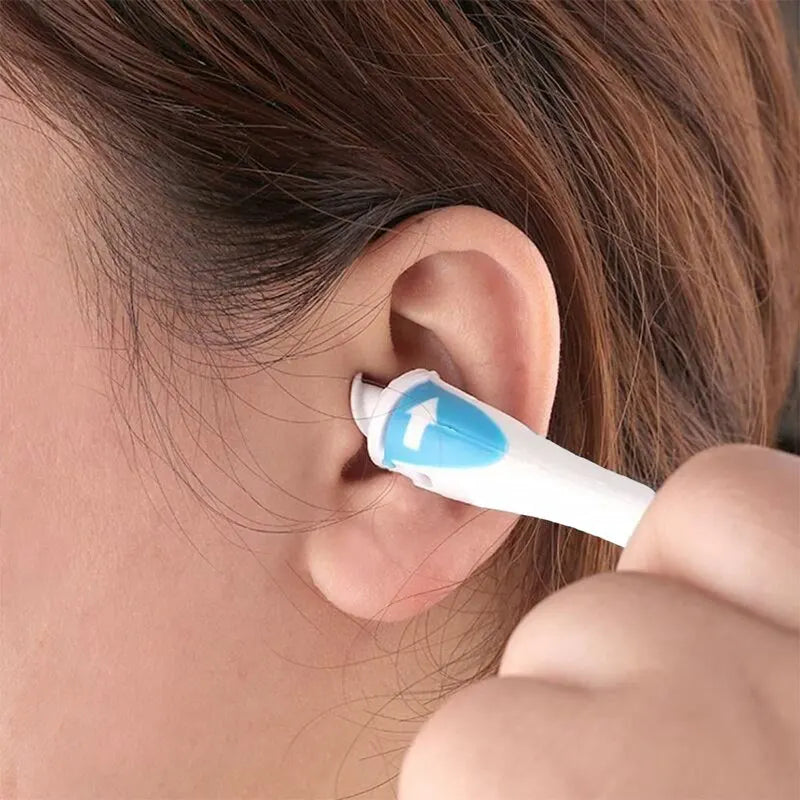 Hand holding a gentle spiral ear cleaner, demonstrating ease of use for parents
