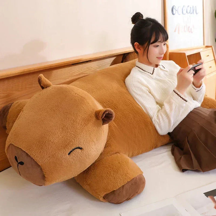 Giant capybara plush toy for cuddles, stress relief & comfort. Super soft animal plushie, perfect gift.