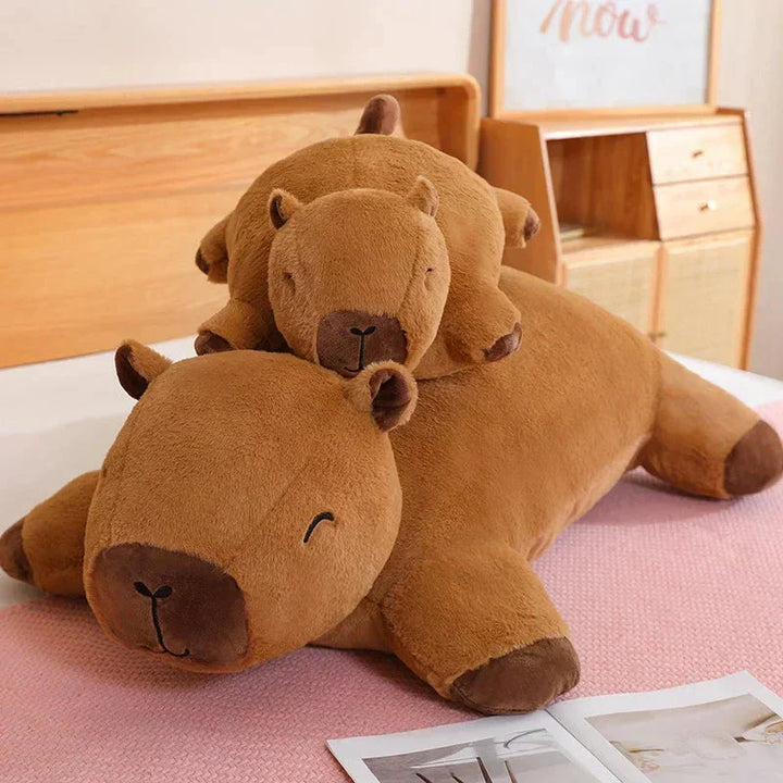 Big capybara animal plushie, perfect for cozy cuddles and support. Comforting soft toy gift.