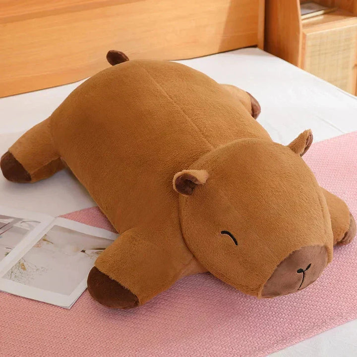 Charming giant capybara plush, a lovable soft animal toy & stress-relief cuddle pillow.