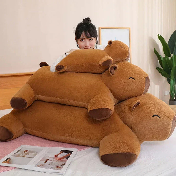 Cozy giant capybara plush, a soft cuddle pillow & animal toy for ultimate comfort & stress relief.