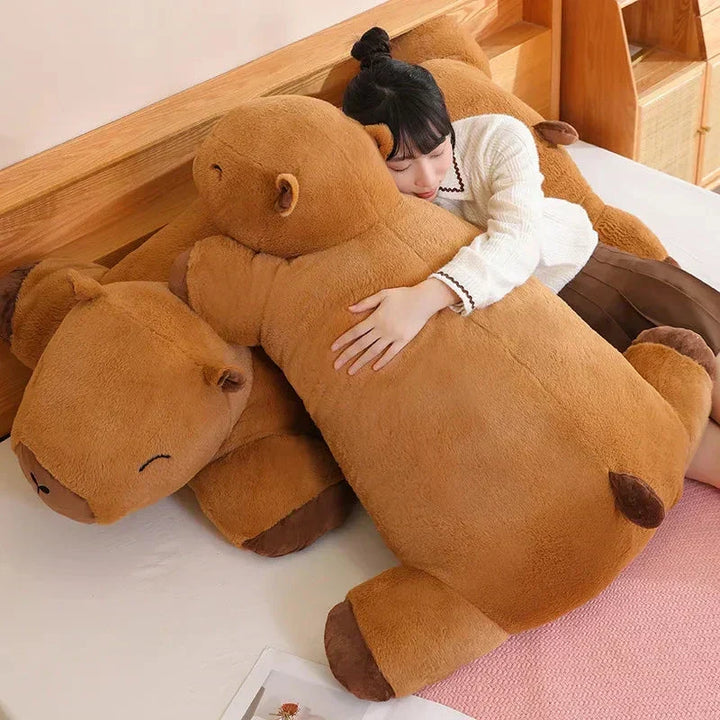 Huggable giant capybara, soft animal toy & stress relief pillow. Perfect gift for kids.