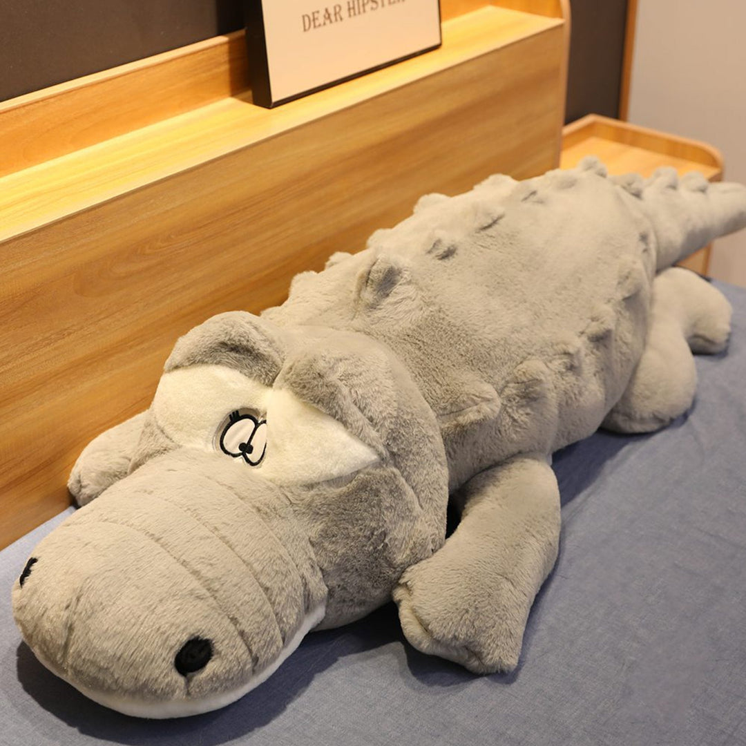 Large unisex crocodile plush support pillow. Hypoallergenic, soft companion & gift for kids and adults to cuddle.