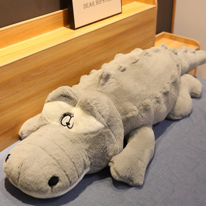 Large unisex crocodile plush support pillow. Hypoallergenic, soft companion & gift for kids and adults to cuddle.