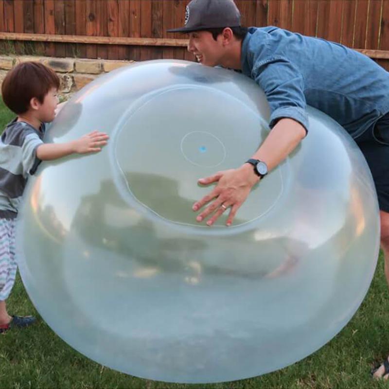 Large inflatable bubble ball for outdoor summer fun, parties, and active kids games.