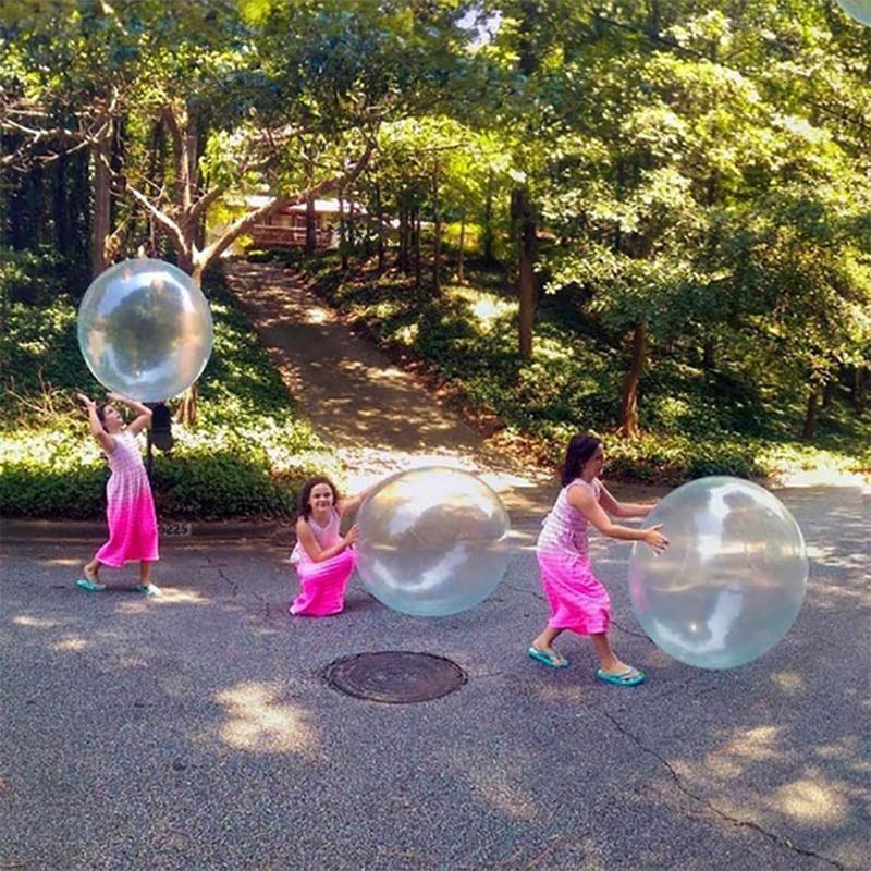 Bubble-like giant inflatable ball, tear-resistant for endless outdoor fun and active play.