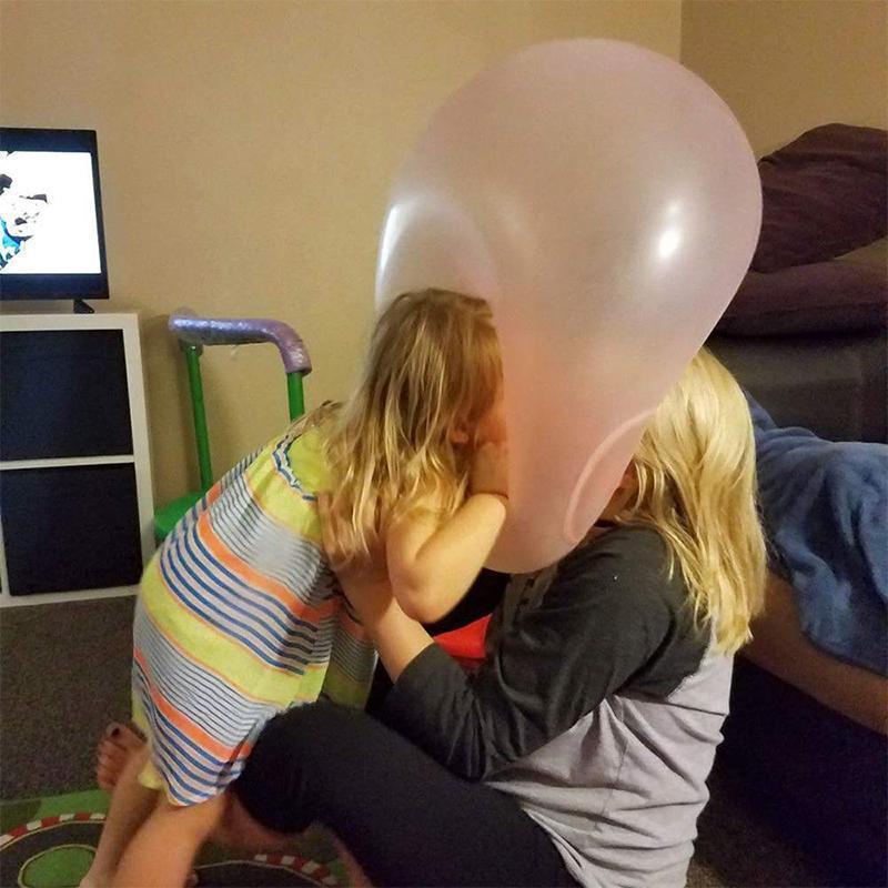 Playful giant inflatable bubble ball, perfect outdoor toy for kids' summer games and parties.