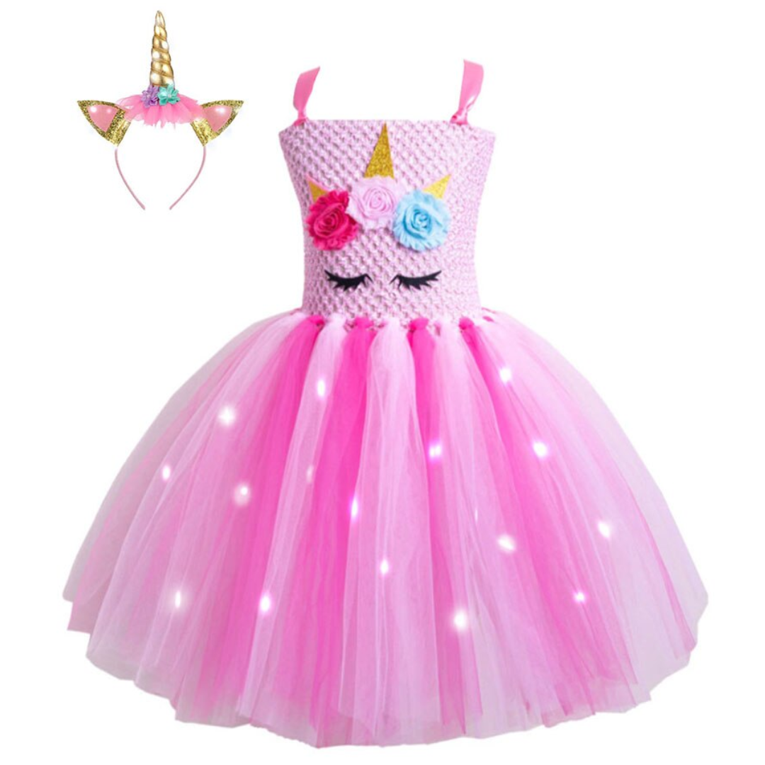 Toddler girl wearing a vibrant Unicorn Princess Tulle Dress with glowing LED skirt, ideal for parties