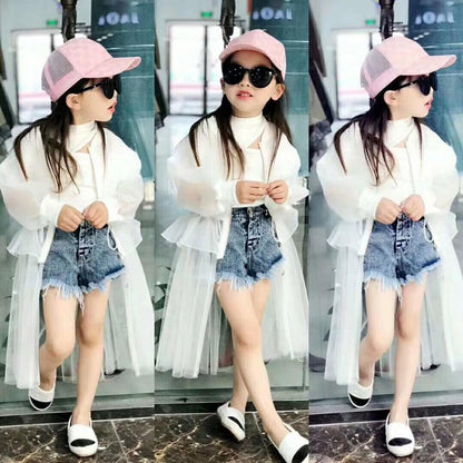 Girl in stylish mesh zipper coat with pleated skirt, ideal children's fall fashion.