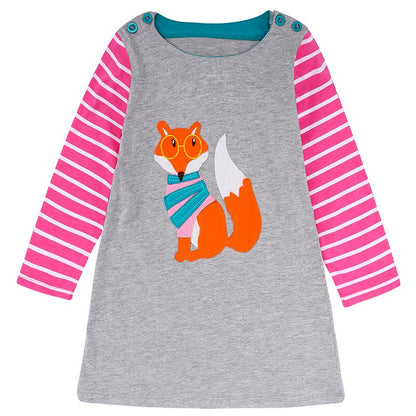 Close-up of rabbit applique on a soft cotton long sleeve dress for baby girls.