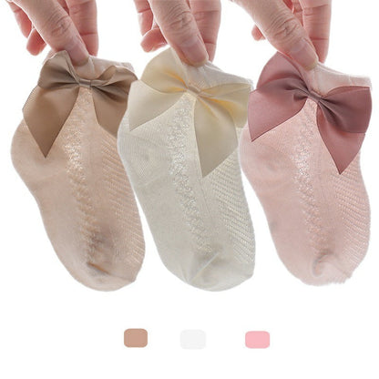 Newborn girls' cotton mesh ankle socks 3-pack, featuring decorative bows for infant comfort & style