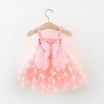 Close-up of the intricate 3D butterfly details on a girls' pink princess summer dress