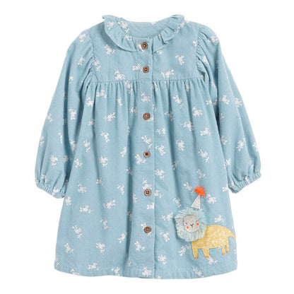 Close-up of adorable equestrian print on girls' long sleeve cotton dress. Cute detail for toddlers & kids.