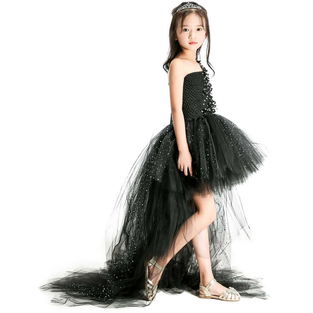 Kids fashion black sleeveless party dress with starry pattern and elegant trailing tulle