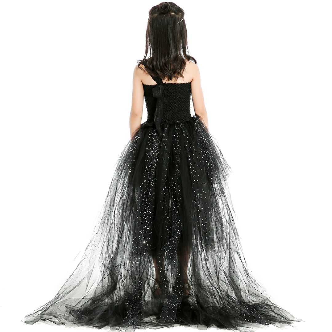 Full-length view of a girl's black starry trailing princess party dress, ideal for toddlers