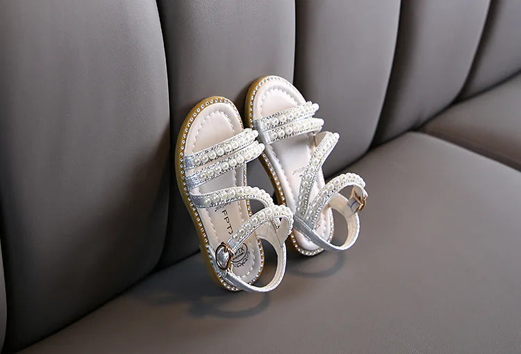 Girls' summer footwear: pink rhinestone sandals with secure hook and loop fastener