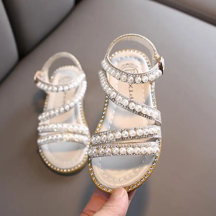 Side view of girls' summer sandals, featuring bling rhinestones and comfort design